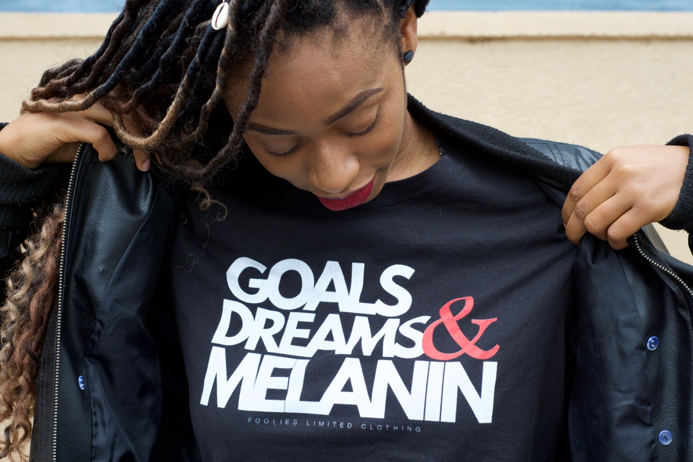 Black woman in melanin T shirt