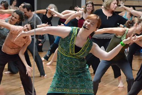 People participating in a Nia Movement class
