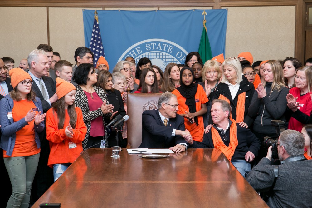 Jay Inslee signs the bump stock ban