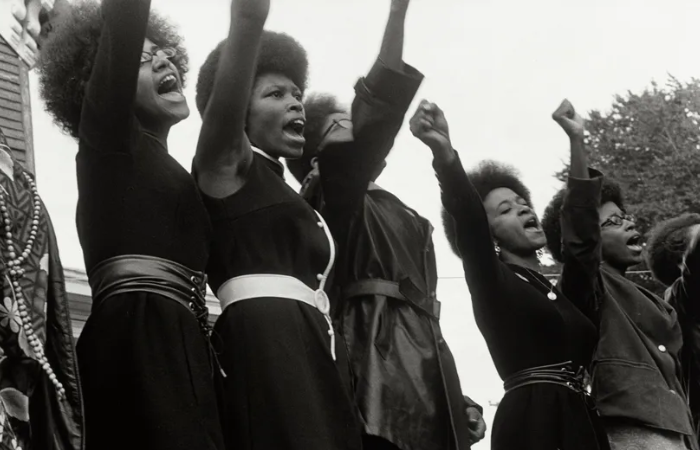 A photo taken at a Free Huey Newton Rally in 1968 with five of the six women identifiable—Delores Henderson, Joyce Lee, Mary Ann Carlton, Joyce Means and Paula Hill—provides testament to those who actualized the daily operations of the Black Panther Party. NMAAHC, gift of the Pirkle Jones Foundation, ©2011 Pirkle Jones Foundation