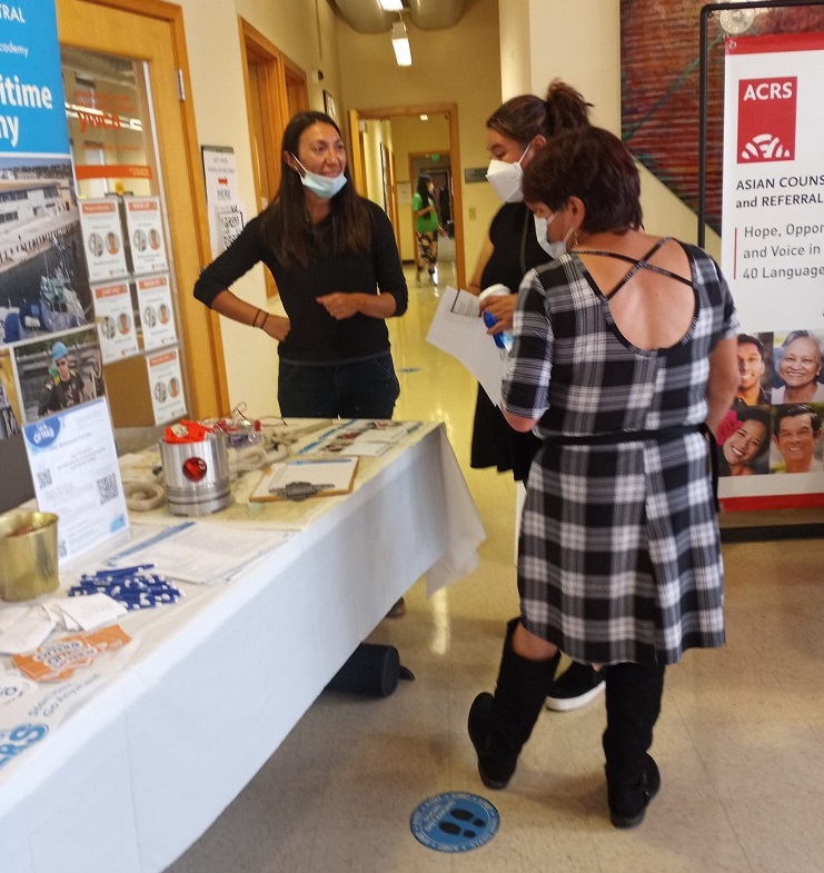 Allison from Seattle MariTime Academy talking with clients