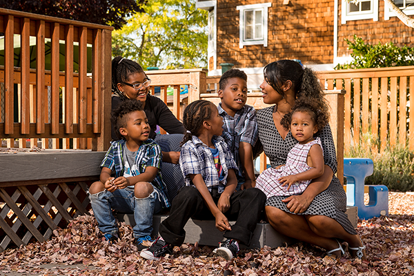 A woman and her children are pictured