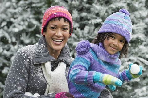 Mother and child in snow