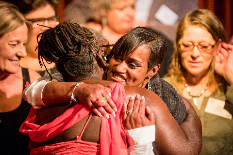 Photo of women hugging