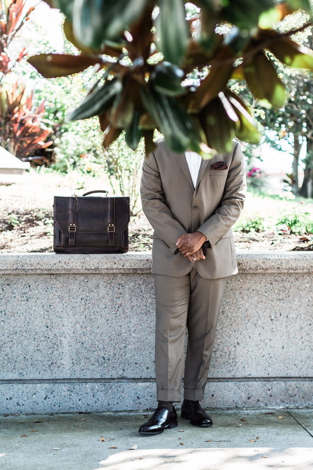 Man Behind Tree