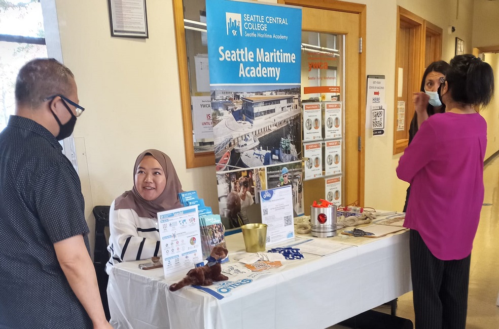 Mina and Olivier talking with South Seattle College Partner and Seattle MariTime Academy