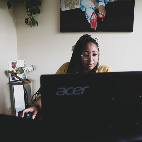 Photo of woman at computer