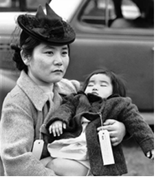 Black and white photo of Fukimo Hayashida holding her 13 month old daughter Natalie
