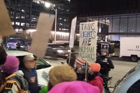 A sign reading "Trans rights are human rights" at a protest against an anti-trans group speaking at the Seattle Public Library