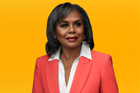 Photo of Anita Hill against an orange background.