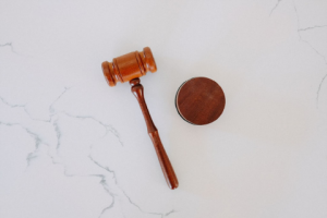 Photo of a gavel and block on a marble background